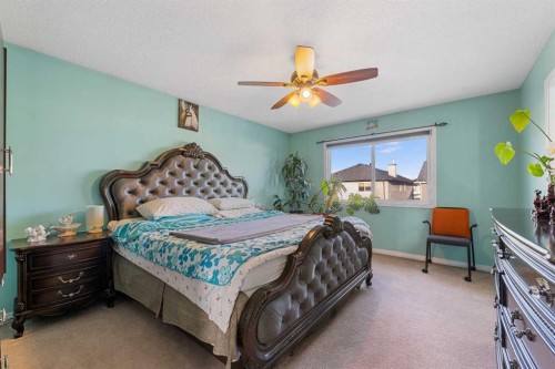 17 Saddlecrest Crescent Ne, Calgary, AB - Indoor Photo Showing Bedroom