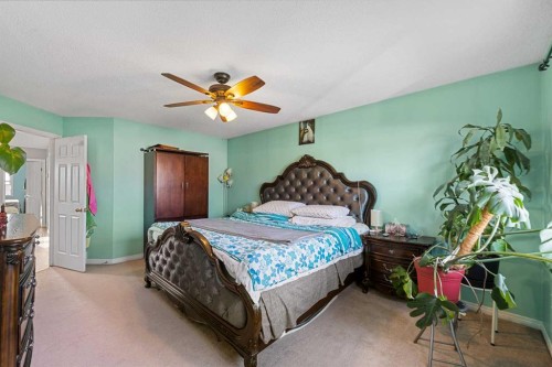 17 Saddlecrest Crescent Ne, Calgary, AB - Indoor Photo Showing Bedroom
