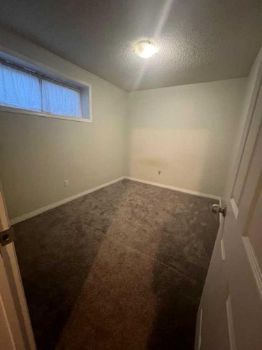 17 Saddlecrest Crescent Ne, Calgary, AB - Indoor Photo Showing Other Room