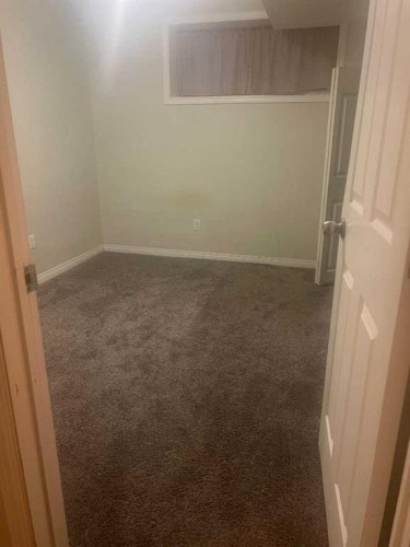 17 Saddlecrest Crescent Ne, Calgary, AB - Indoor Photo Showing Other Room