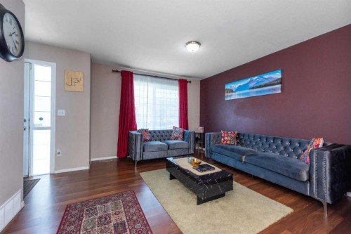 10 Tarawood Lane Ne, Calgary, AB - Indoor Photo Showing Living Room
