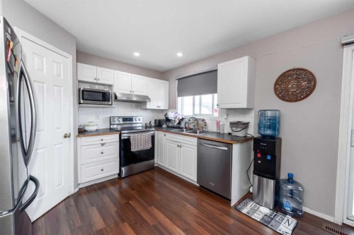 10 Tarawood Lane Ne, Calgary, AB - Indoor Photo Showing Kitchen With Double Sink