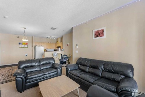 1406-333 Taravista Drive Ne, Calgary, AB - Indoor Photo Showing Living Room