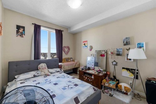 1406-333 Taravista Drive Ne, Calgary, AB - Indoor Photo Showing Bedroom