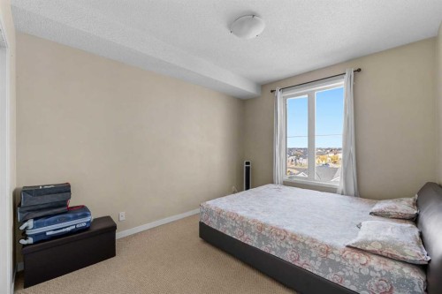 1406-333 Taravista Drive Ne, Calgary, AB - Indoor Photo Showing Bedroom
