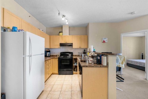 1406-333 Taravista Drive Ne, Calgary, AB - Indoor Photo Showing Kitchen