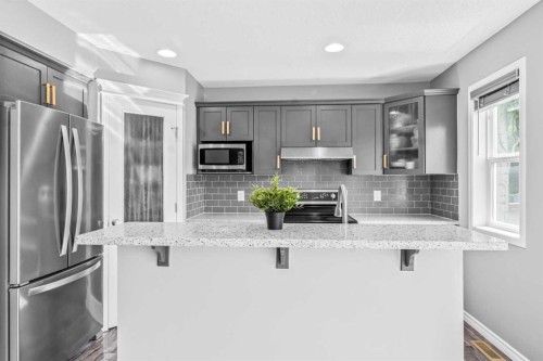 178 Evansmeade Common Nw, Calgary, AB - Indoor Photo Showing Kitchen With Upgraded Kitchen