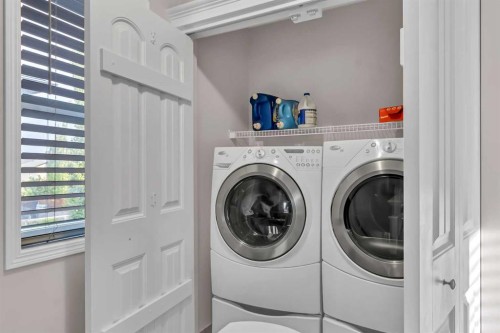 178 Evansmeade Common Nw, Calgary, AB - Indoor Photo Showing Laundry Room