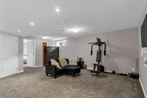 178 Evansmeade Common Nw, Calgary, AB - Indoor Photo Showing Gym Room