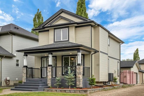 178 Evansmeade Common Nw, Calgary, AB - Outdoor With Deck Patio Veranda With Facade