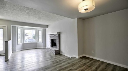 124 Riverbrook Way Se, Calgary, AB - Indoor With Fireplace