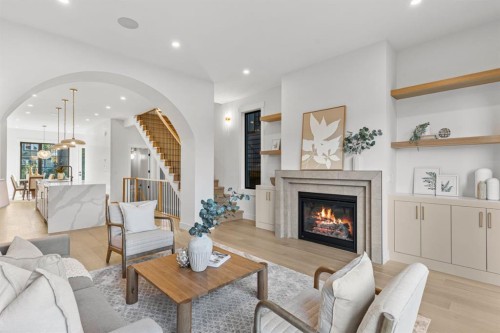 1904 48 Avenue Sw, Calgary, AB - Indoor Photo Showing Living Room With Fireplace
