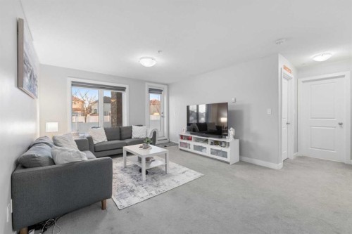 1105-6118 80 Avenue Ne, Calgary, AB - Indoor Photo Showing Living Room