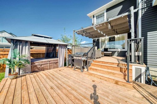 6 Emberside Green, Cochrane, AB - Outdoor With Deck Patio Veranda With Exterior