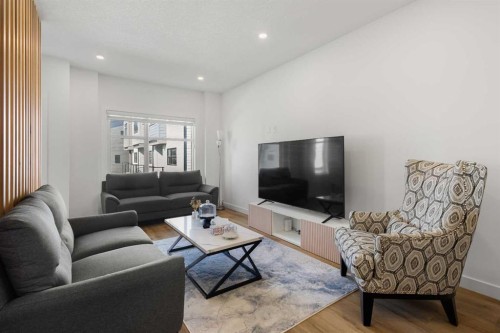 61-903 Mahogany Boulevard Se, Calgary, AB - Indoor Photo Showing Living Room