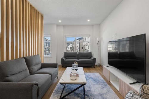 61-903 Mahogany Boulevard Se, Calgary, AB - Indoor Photo Showing Living Room