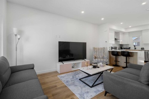 61-903 Mahogany Boulevard Se, Calgary, AB - Indoor Photo Showing Living Room