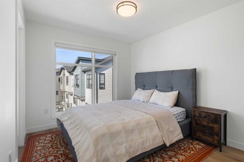 61-903 Mahogany Boulevard Se, Calgary, AB - Indoor Photo Showing Bedroom