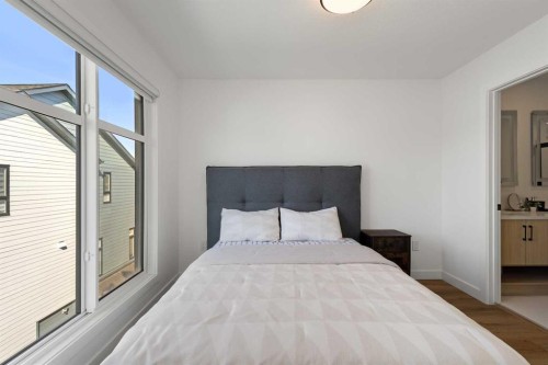 61-903 Mahogany Boulevard Se, Calgary, AB - Indoor Photo Showing Bedroom