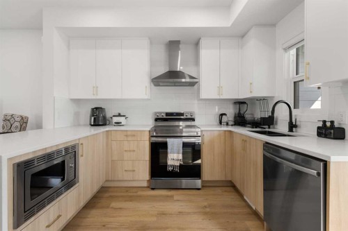61-903 Mahogany Boulevard Se, Calgary, AB - Indoor Photo Showing Kitchen With Stainless Steel Kitchen