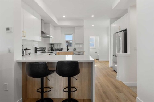 61-903 Mahogany Boulevard Se, Calgary, AB - Indoor Photo Showing Kitchen With Upgraded Kitchen