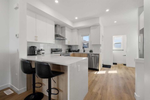 61-903 Mahogany Boulevard Se, Calgary, AB - Indoor Photo Showing Kitchen With Stainless Steel Kitchen With Upgraded Kitchen