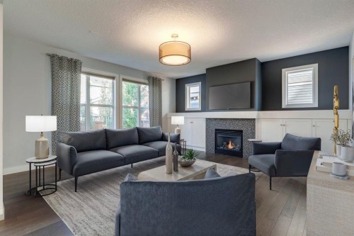 427 Canals Boulevard Sw, Airdrie, AB - Indoor Photo Showing Living Room With Fireplace