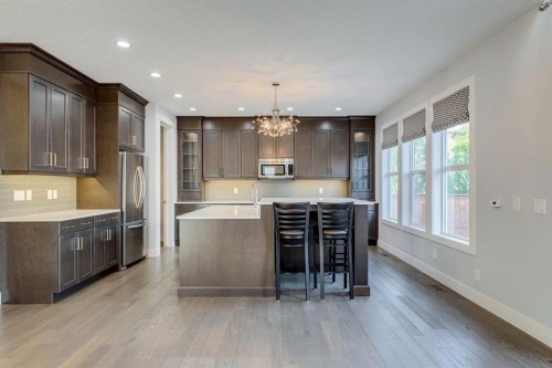 427 Canals Boulevard Sw, Airdrie, AB - Indoor Photo Showing Kitchen With Upgraded Kitchen