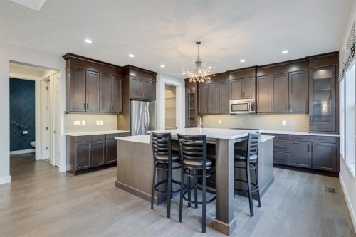 427 Canals Boulevard Sw, Airdrie, AB - Indoor Photo Showing Kitchen With Upgraded Kitchen