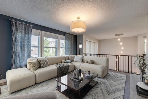 427 Canals Boulevard Sw, Airdrie, AB - Indoor Photo Showing Living Room