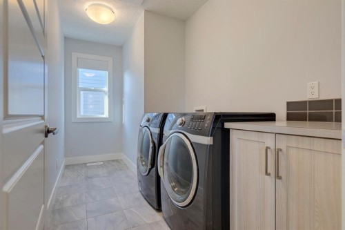 427 Canals Boulevard Sw, Airdrie, AB - Indoor Photo Showing Laundry Room