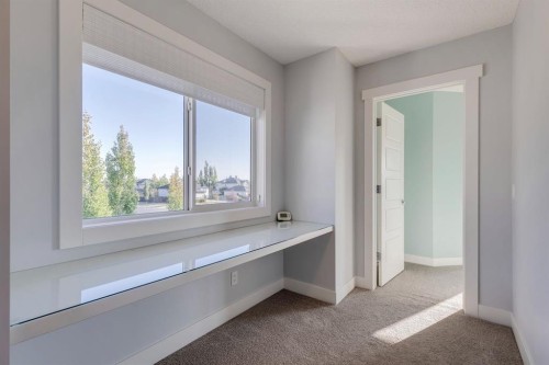 427 Canals Boulevard Sw, Airdrie, AB - Indoor Photo Showing Other Room