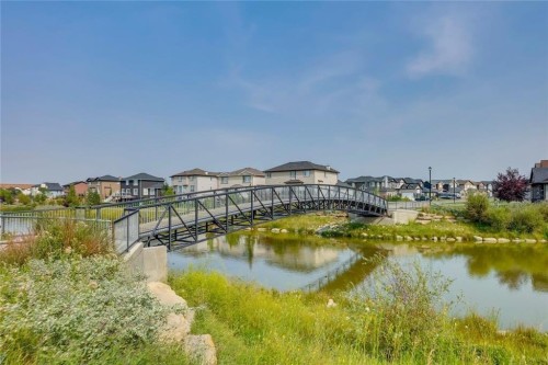 427 Canals Boulevard Sw, Airdrie, AB - Outdoor With Body Of Water With View