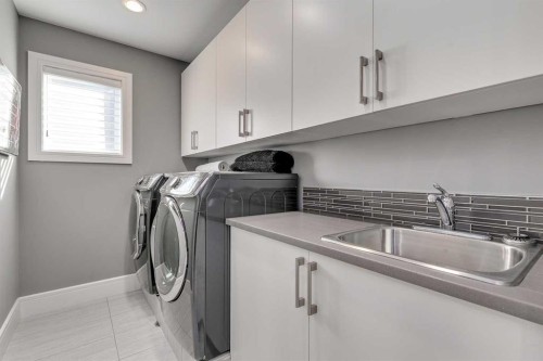 506 54 Avenue Sw, Calgary, AB - Indoor Photo Showing Laundry Room