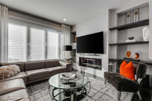 506 54 Avenue Sw, Calgary, AB - Indoor Photo Showing Living Room With Fireplace