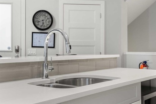 2-530 56 Avenue Sw, Calgary, AB - Indoor Photo Showing Kitchen With Double Sink