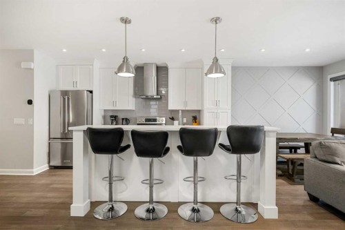 2-530 56 Avenue Sw, Calgary, AB - Indoor Photo Showing Kitchen With Stainless Steel Kitchen With Upgraded Kitchen