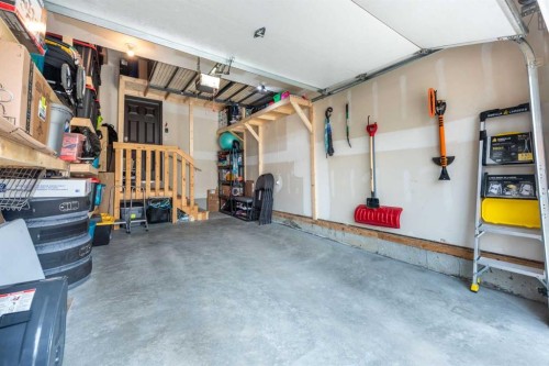 80 Legacy Reach Manor Se, Calgary, AB - Indoor Photo Showing Garage