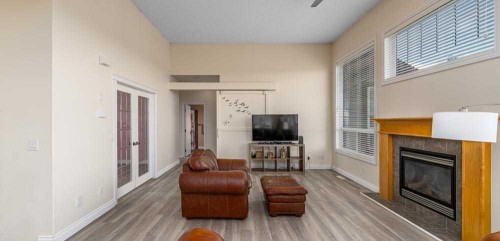 88 Sharp Hill Drive, Rural Rocky View County, AB - Indoor Photo Showing Living Room With Fireplace