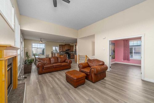 88 Sharp Hill Drive, Rural Rocky View County, AB - Indoor Photo Showing Living Room With Fireplace