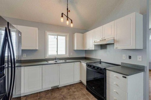 2142 Country Hills Circle Nw, Calgary, AB - Indoor Photo Showing Kitchen With Double Sink