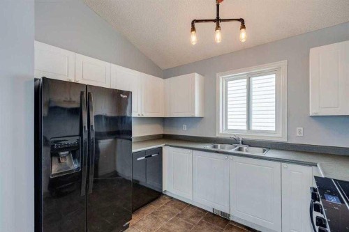 2142 Country Hills Circle Nw, Calgary, AB - Indoor Photo Showing Kitchen With Double Sink