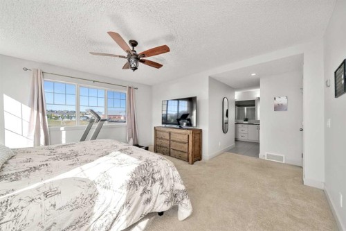 49 Marquis Grove Se, Calgary, AB - Indoor Photo Showing Bedroom