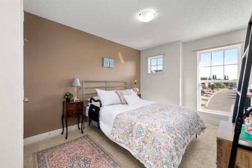 49 Marquis Grove Se, Calgary, AB - Indoor Photo Showing Bedroom
