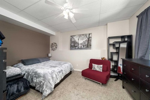 49 Marquis Grove Se, Calgary, AB - Indoor Photo Showing Bedroom