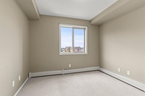 316-15 Saddlestone Way Ne, Calgary, AB - Indoor Photo Showing Other Room