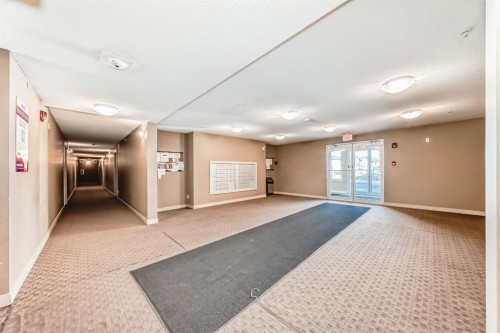 316-15 Saddlestone Way Ne, Calgary, AB - Indoor Photo Showing Other Room