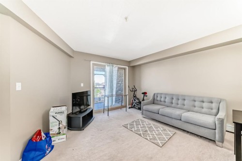 316-15 Saddlestone Way Ne, Calgary, AB - Indoor Photo Showing Living Room