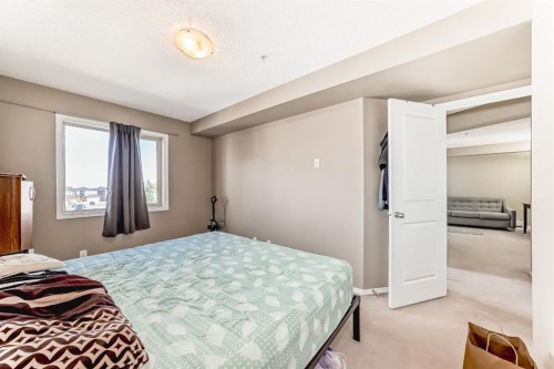 316-15 Saddlestone Way Ne, Calgary, AB - Indoor Photo Showing Bedroom