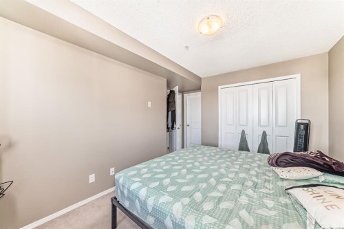 316-15 Saddlestone Way Ne, Calgary, AB - Indoor Photo Showing Bedroom
